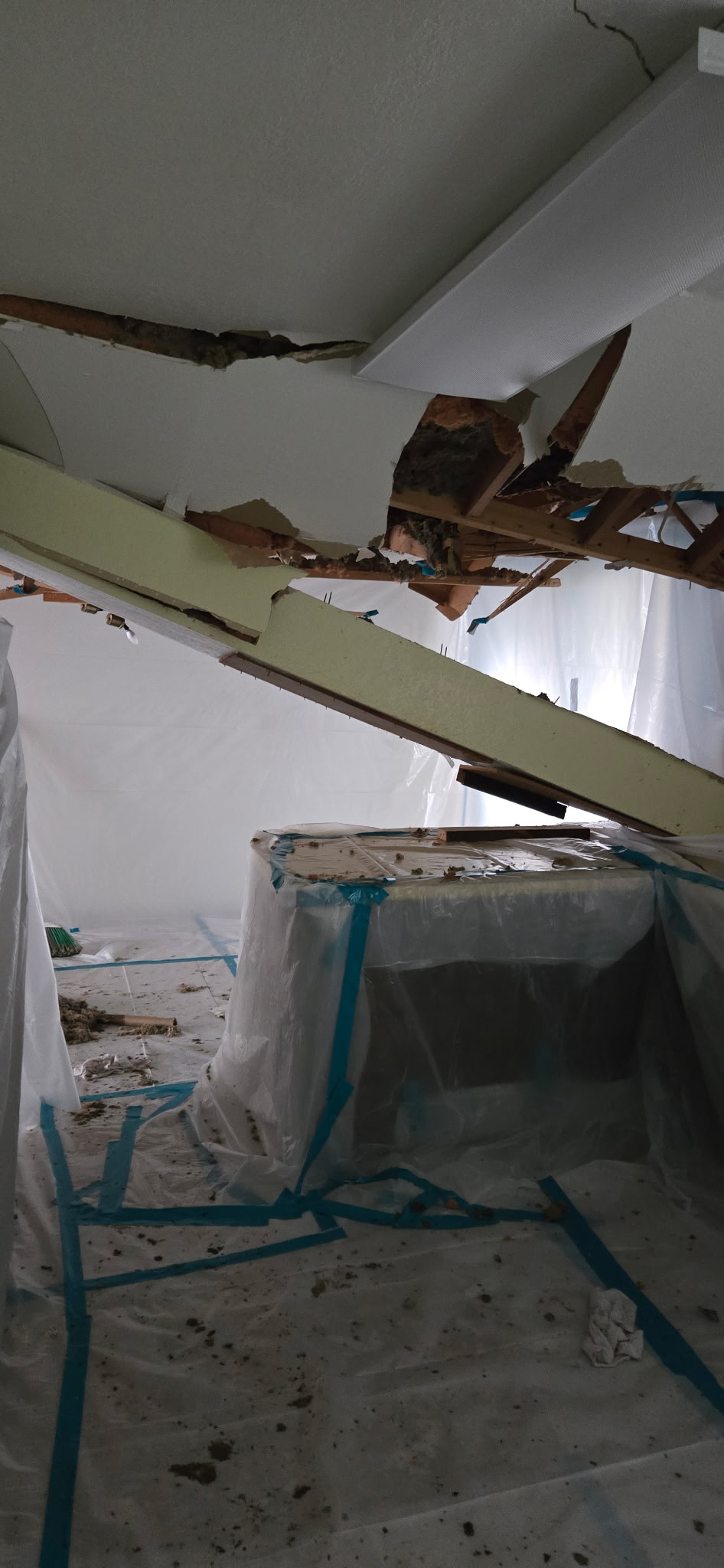 Interior ceiling abatement with poly sheeting