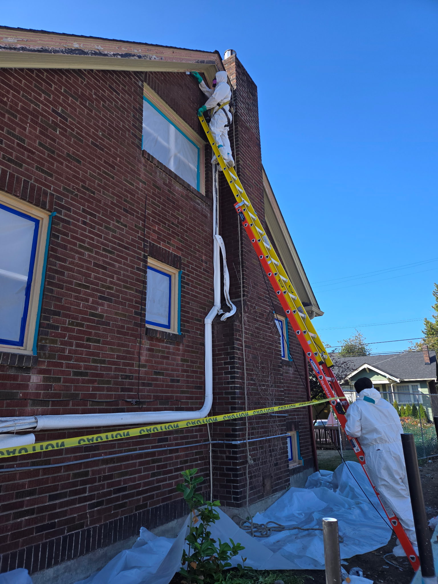 Exterior asbestos removal on brick building
